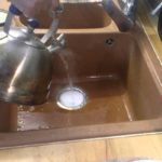 Прочистка трубы горячей водой